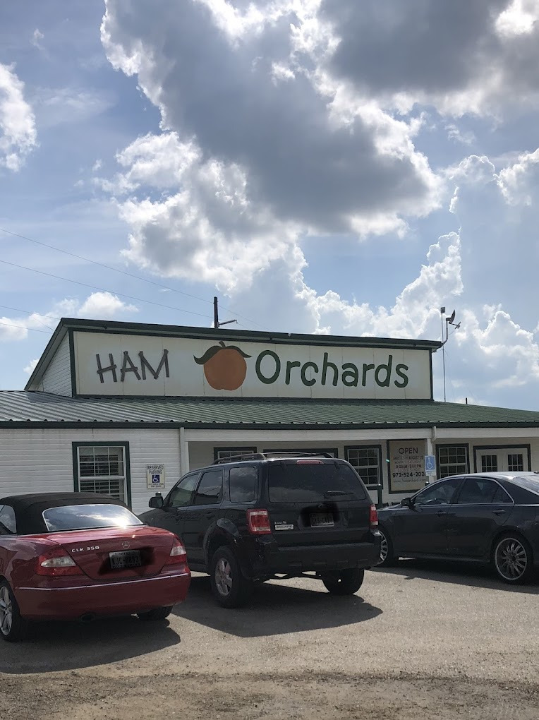 The storefront at Ham Orchards under a bright sky